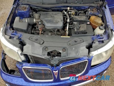 Zdjęcie 11 z 12 samochodu: 2006 PONTIAC TORRENT VIN:2CKDL63F366028007 - miniatura