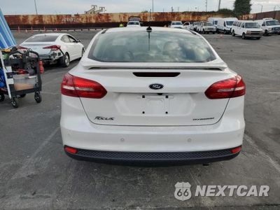 Zdjęcie 6 z 11 samochodu: 2015 FORD FOCUS TITANIUM VIN:1FADP3J21FL361796 - miniatura