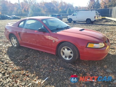 Czwarte zdjęcie samochodu z boku: 1999 FORD MUSTANG VIN:1FAFP404XXF125357 - miniatura