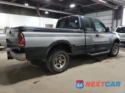 Trzecie zdjęcie samochodu z tyłu: 1997 FORD F150 VIN:1FTEX18L2VNC68841 - miniatura