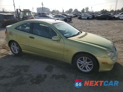 Czwarte zdjęcie samochodu z boku: 2003 MERCEDES-BENZ C 230K SPORT COUPE VIN:WDBRN40J73A482374 - miniatura