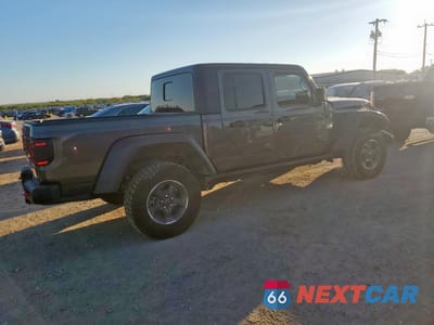 Trzecie zdjęcie samochodu z tyłu: 2023 JEEP GLADIATOR RUBICON VIN:1C6JJTBGXPL585876 - miniatura