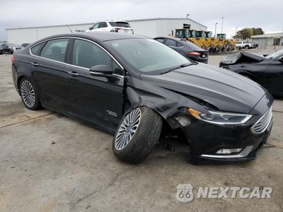 Czwarte zdjęcie samochodu z boku: 2017 FORD FUSION TITANIUM PHEV VIN:3FA6P0SUXHR141682 - miniatura