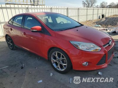 Czwarte zdjęcie samochodu z boku: 2014 FORD FOCUS VIN:1FADP3F29EL314667 - miniatura