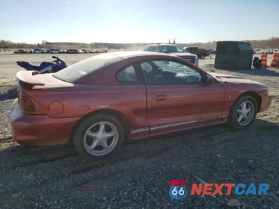 Trzecie zdjęcie samochodu z tyłu: 1998 FORD MUSTANG VIN:1FAFP4041WF155362 - miniatura