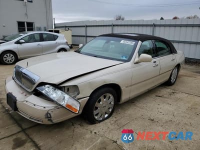 2003 LINCOLN TOWN CAR CARTIER 1LNHM83W23Y619173 - główne zdjęcie licytacji z USA - miniatura