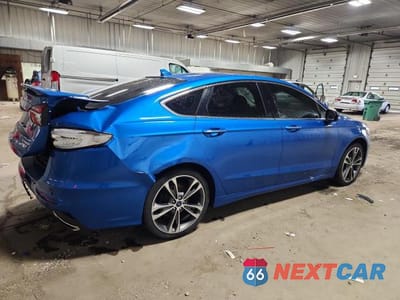 Trzecie zdjęcie samochodu z tyłu: 2020 FORD FUSION TITANIUM VIN:3FA6P0D92LR130497 - miniatura