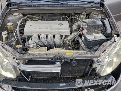 Zdjęcie 11 z 12 samochodu: 2004 TOYOTA COROLLA CE VIN:1NXBR32E54Z329392 - miniatura