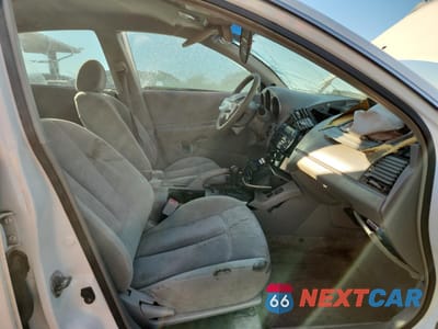 Zdjęcie 7 z 13 samochodu: 2004 NISSAN ALTIMA BASE VIN:1N4AL11D84C100425 - miniatura