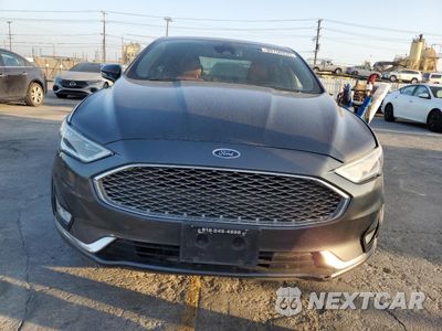 Piąte zdjęcie samochodu w środku: 2019 FORD FUSION TITANIUM VIN:3FA6P0SU6KR231743 - miniatura