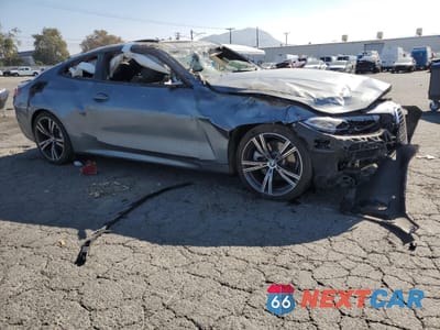 Czwarte zdjęcie samochodu z boku: 2022 BMW 430I VIN:WBA53AP06NCK11506 - miniatura