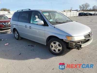 Czwarte zdjęcie samochodu z boku: 2001 HONDA ODYSSEY EX VIN:2HKRL186X1H607377 - miniatura