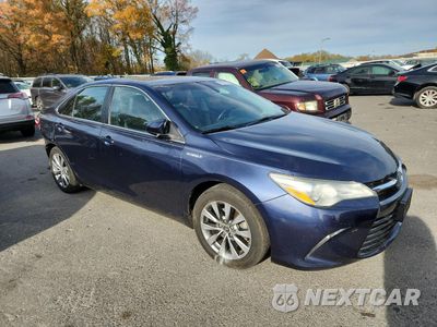 Czwarte zdjęcie samochodu z boku: 2016 TOYOTA CAMRY HYBRID VIN:4T1BD1FKXGU180906 - miniatura