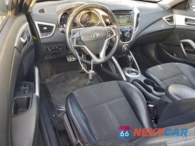 Zdjęcie 8 z 12 samochodu: 2013 HYUNDAI VELOSTER VIN:KMHTC6AD0DU093198 - miniatura