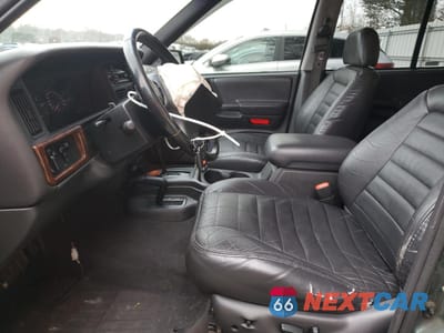 Zdjęcie 7 z 15 samochodu: 1998 JEEP GRAND CHEROKEE LAREDO VIN:1J4GZ48Y7WC276165 - miniatura