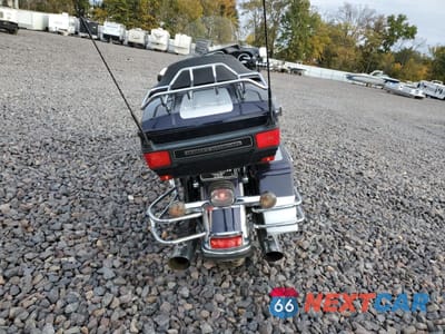 Czwarte zdjęcie samochodu z boku: 2009 HARLEY-DAVIDSON FLHTCU VIN:1HD1FC4169Y677588 - miniatura