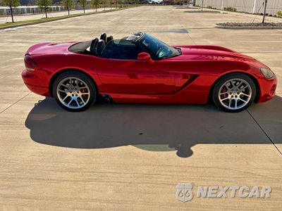 Zdjęcie 13 z 15 samochodu: 2004 DODGE VIPER SRT-10 VIN:1B3JZ65Z74V100319 - miniatura