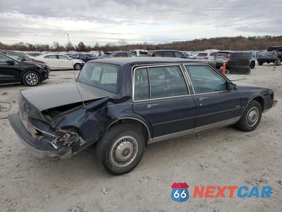 Trzecie zdjęcie samochodu z tyłu: 1990 OLDSMOBILE 98 REGENCY VIN:1G3CX54CXL4356754 - miniatura