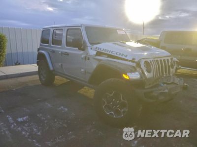 Czwarte zdjęcie samochodu z boku: 2021 JEEP WRANGLER UNLIMITED RUBICON 4XE VIN:1C4JJXR63MW700292 - miniatura