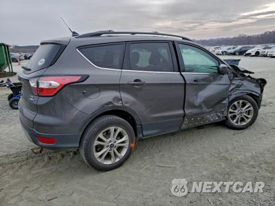 Trzecie zdjęcie samochodu z tyłu: 2018 FORD ESCAPE SE VIN:1FMCU9GD0JUC99896 - miniatura
