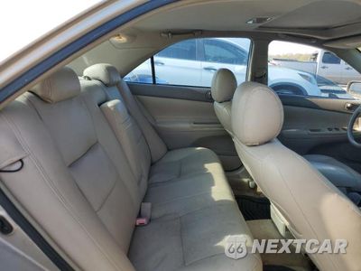 Zdjęcie 10 z 12 samochodu: 2002 TOYOTA CAMRY LE VIN:4T1BE32K02U033713 - miniatura