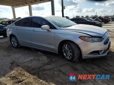 Czwarte zdjęcie samochodu z boku: 2017 FORD FUSION SE HYBRID VIN:3FA6P0LU3HR141571 - miniatura