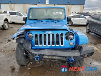 Piąte zdjęcie samochodu w środku: 2016 JEEP WRANGLER UNLIMITED SAHARA VIN:1C4BJWEG5GL310295 - miniatura