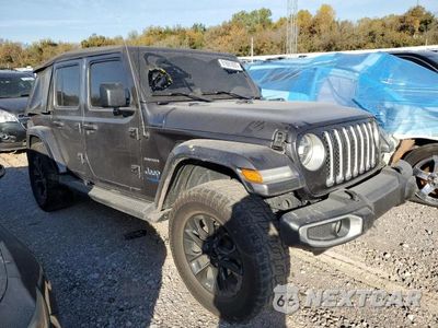 Czwarte zdjęcie samochodu z boku: 2021 JEEP WRANGLER UNLIMITED SAHARA 4XE VIN:1C4JJXP64MW676989 - miniatura