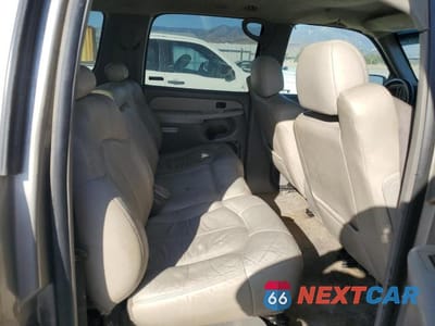 Zdjęcie 11 z 13 samochodu: 2002 CHEVROLET SUBURBAN C1500 VIN:1GNEC16T42J216099 - miniatura