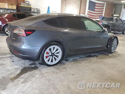 Trzecie zdjęcie samochodu z tyłu: 2021 TESLA MODEL 3 VIN:5YJ3E1EC2MF001665 - miniatura