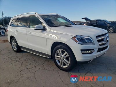 Czwarte zdjęcie samochodu z boku: 2015 MERCEDES-BENZ GL 450 4MATIC VIN:4JGDF6EE3FA533871 - miniatura