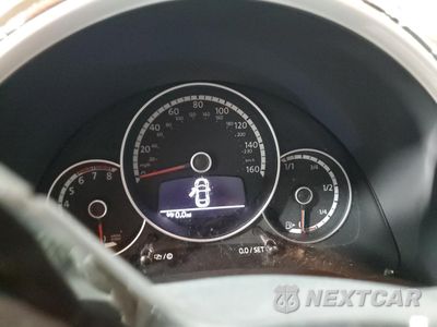 Zdjęcie 9 z 13 samochodu: 2015 VOLKSWAGEN BEETLE R-LINE VIN:3VW7S7AT0FM807552 - miniatura