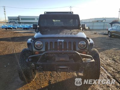 Piąte zdjęcie samochodu w środku: 2011 JEEP WRANGLER UNLIMITED RUBICON VIN:1J4BA6H10BL574020 - miniatura