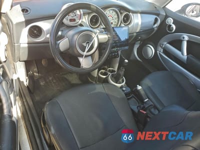 Zdjęcie 8 z 12 samochodu: 2006 MINI COOPER VIN:WMWRC33506TK67568 - miniatura