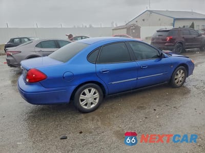 Trzecie zdjęcie samochodu z tyłu: 2003 FORD TAURUS SEL VIN:1FAHP56S03A156340 - miniatura