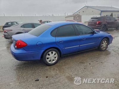 Trzecie zdjęcie samochodu z tyłu: 2003 FORD TAURUS SEL VIN:1FAHP56S03A156340 - miniatura
