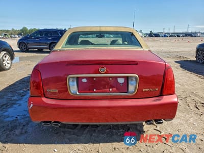 Zdjęcie 6 z 12 samochodu: 2004 CADILLAC DEVILLE VIN:1G6KD54YX4U215266 - miniatura