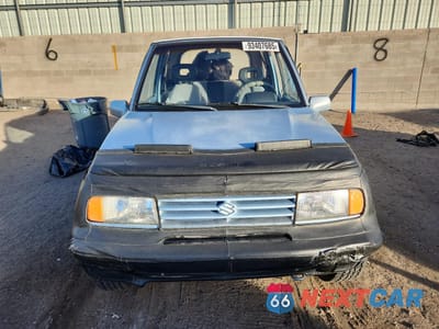 Piąte zdjęcie samochodu w środku: 1989 SUZUKI SIDEKICK JX VIN:JS3TA01C8K4113758 - miniatura