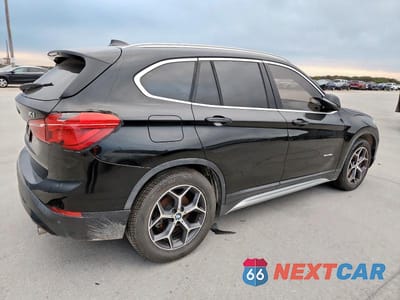 Trzecie zdjęcie samochodu z tyłu: 2018 BMW X1 SDRIVE28I VIN:WBXHU7C30J5H45489 - miniatura