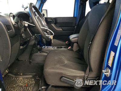 Zdjęcie 7 z 12 samochodu: 2015 JEEP WRANGLER UNLIMITED SPORT VIN:1C4BJWDG5FL692134 - miniatura