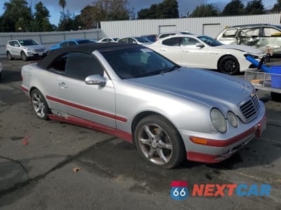 Czwarte zdjęcie samochodu z boku: 2003 MERCEDES-BENZ CLK 320 VIN:WDBLK65G63T130673 - miniatura
