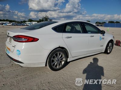 Trzecie zdjęcie samochodu z tyłu: 2017 FORD FUSION SE HYBRID VIN:3FA6P0LU6HR359567 - miniatura