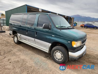 Czwarte zdjęcie samochodu z boku: 1999 FORD ECONOLINE E150 WAGON VIN:1FMRE11L9XHA28314 - miniatura