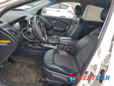 Zdjęcie 7 z 13 samochodu: 2010 HYUNDAI TUCSON GLS VIN:KM8JUCAC6AU080462 - miniatura