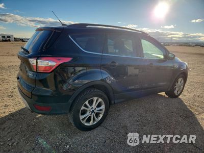 Trzecie zdjęcie samochodu z tyłu: 2017 FORD ESCAPE SE VIN:1FMCU9GD8HUB40005 - miniatura