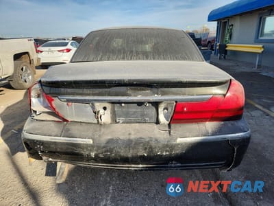 Zdjęcie 6 z 13 samochodu: 2003 MERCURY GRAND MARQUIS LS VIN:2MEFM75W43X641516 - miniatura