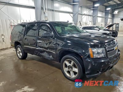 Czwarte zdjęcie samochodu z boku: 2013 CHEVROLET SUBURBAN K1500 LTZ VIN:1GNSKKE75DR313428 - miniatura