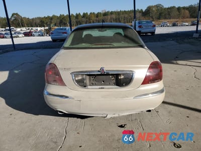 Zdjęcie 6 z 14 samochodu: 2002 LINCOLN CONTINENTAL VIN:1LNHM97V12Y690290 - miniatura