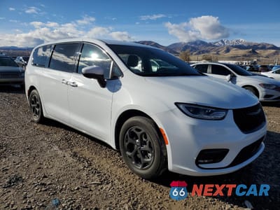 Czwarte zdjęcie samochodu z boku: 2023 CHRYSLER PACIFICA HYBRID TOURING L VIN:2C4RC1L7XPR622716 - miniatura