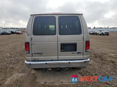 Zdjęcie 6 z 14 samochodu: 2013 FORD ECONOLINE E350 SUPER DUTY WAGON VIN:1FBNE3BL9DDA78280 - miniatura